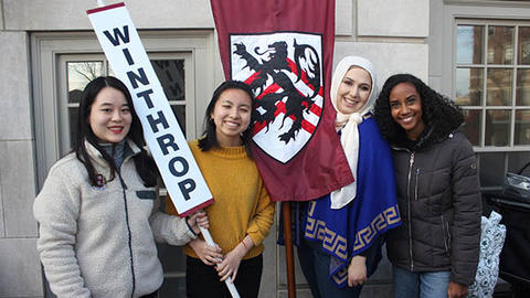 students holding Winthrop flag