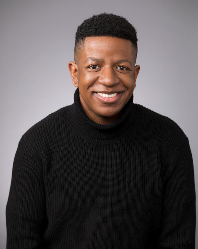headshot of Clayton